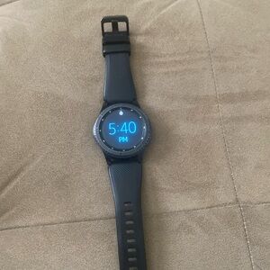 Samsung smart watch  with 2 chargers and 2 dust absorbers